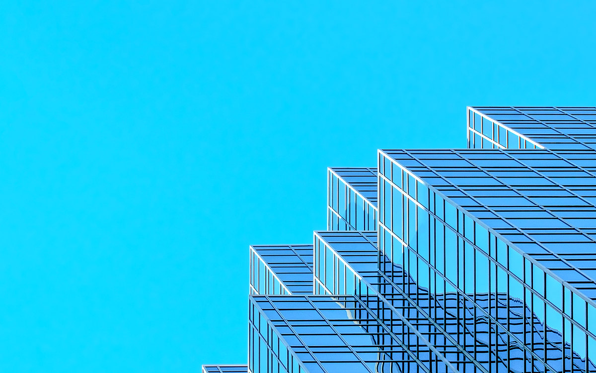 Glass office tower with a stepped facade